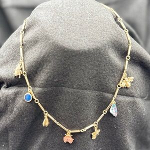 Charming Charlie Necklace gold-toned dangling charms Butterfly Bee Flower Themed
